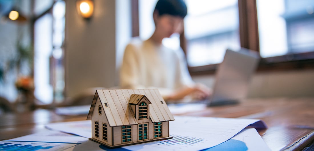 miniature model house on a table