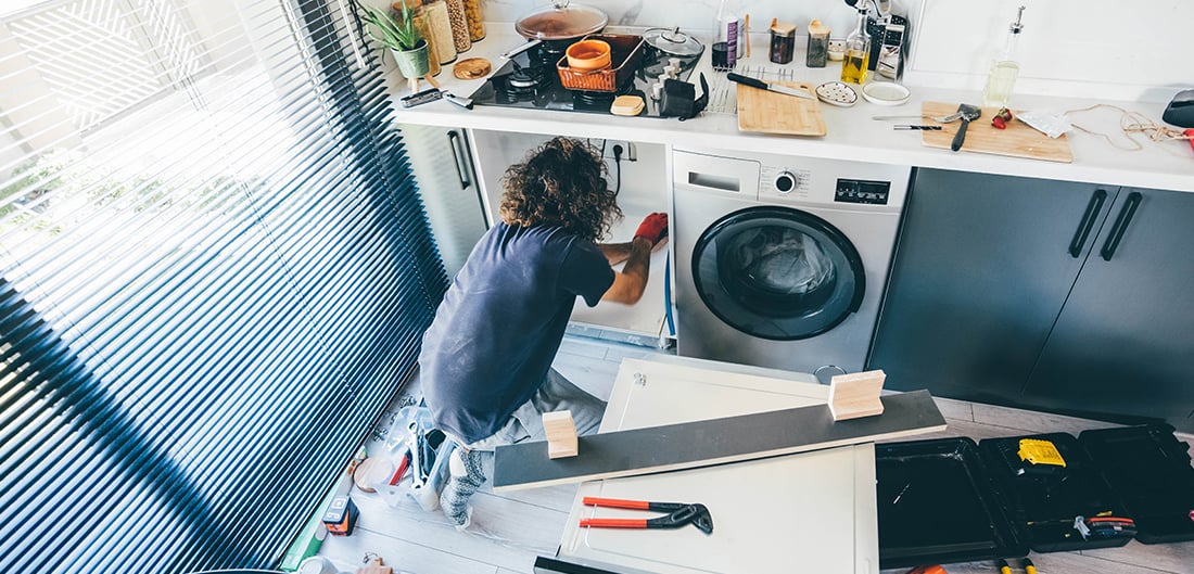 Person working on appliances