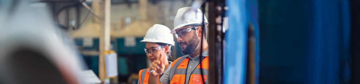 contractors standing outside a building