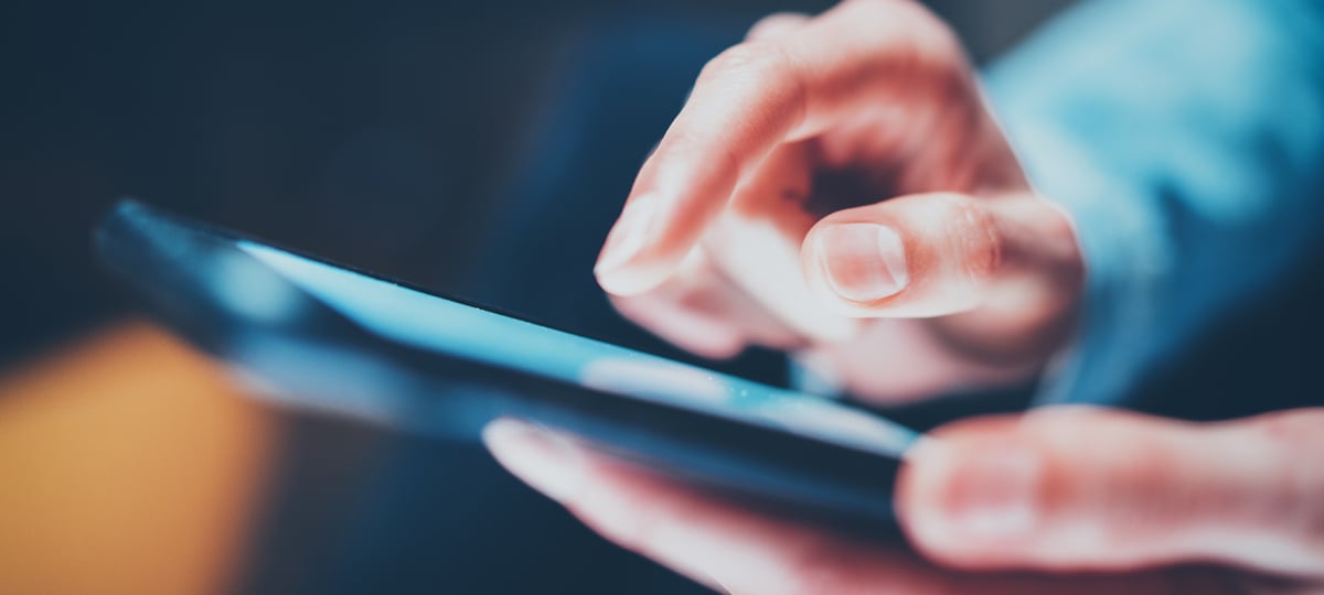 hand using a cell phone