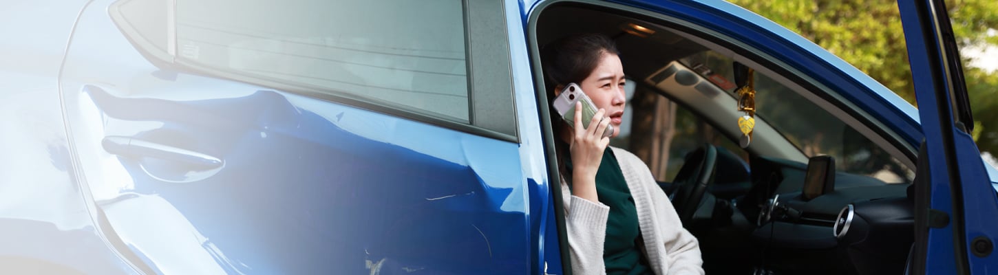 woman on phone in passenger seat