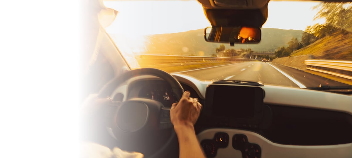 person driving looking out their windshield