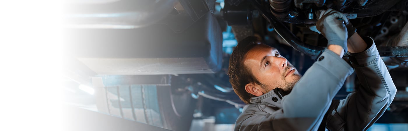 Mechanic working on a vehicle
