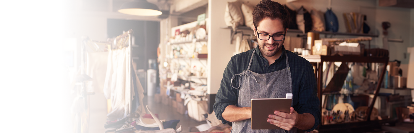 retail worker on tablet