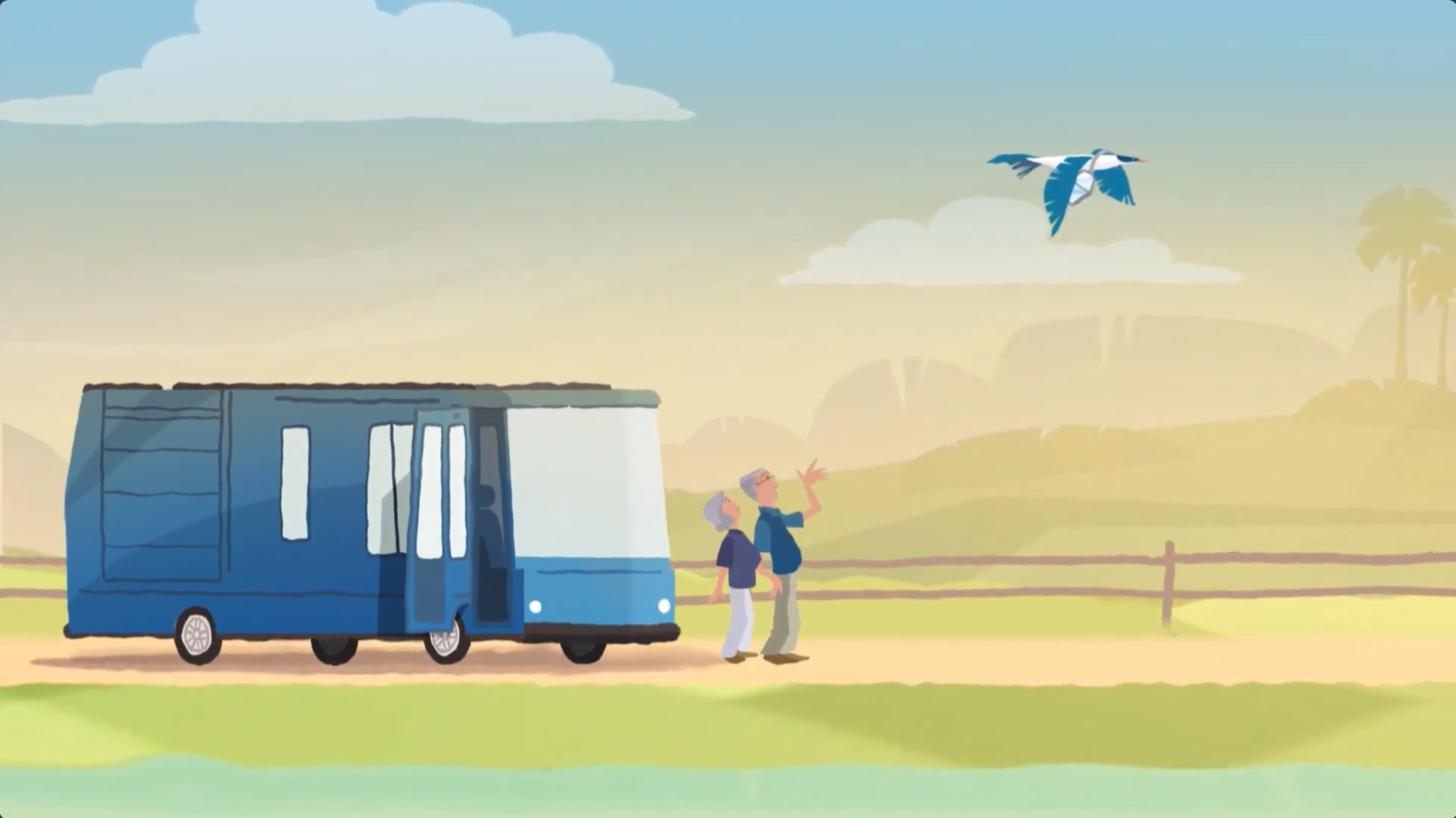 two people standing by RV looking at bird