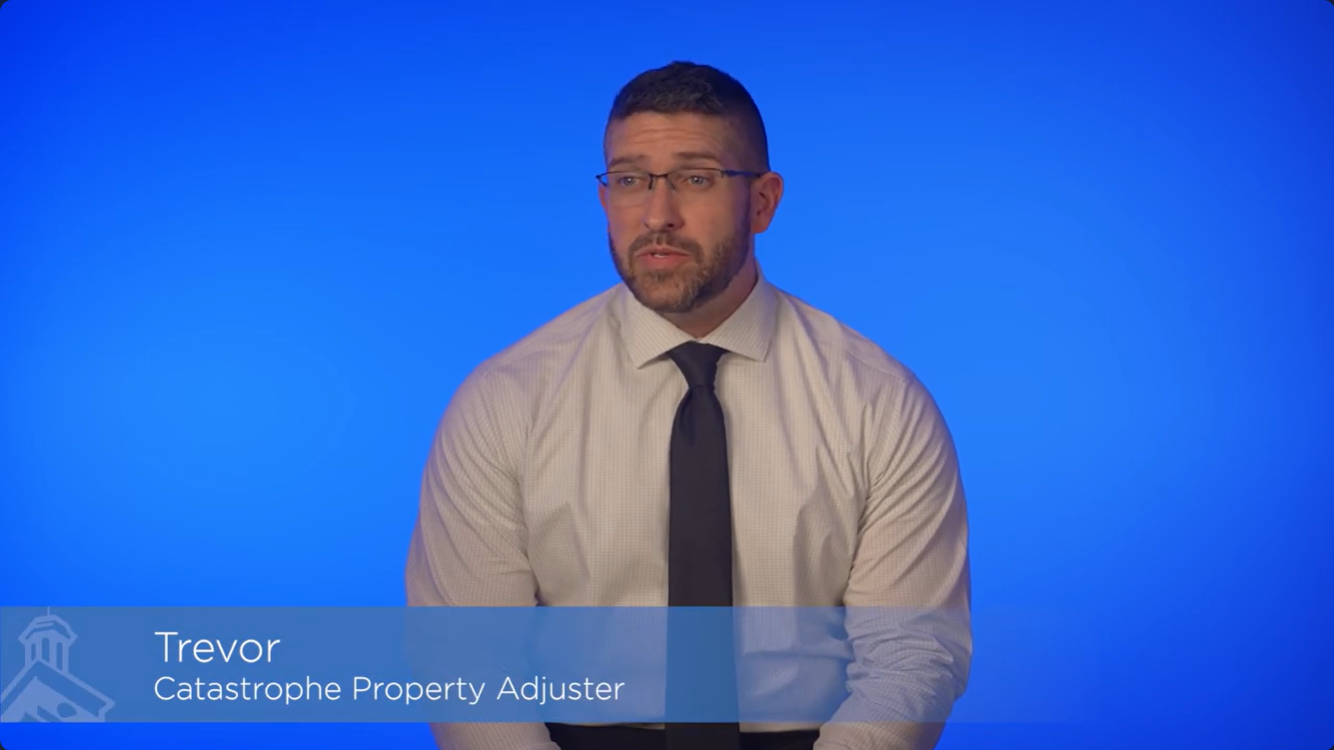man in front of blue background