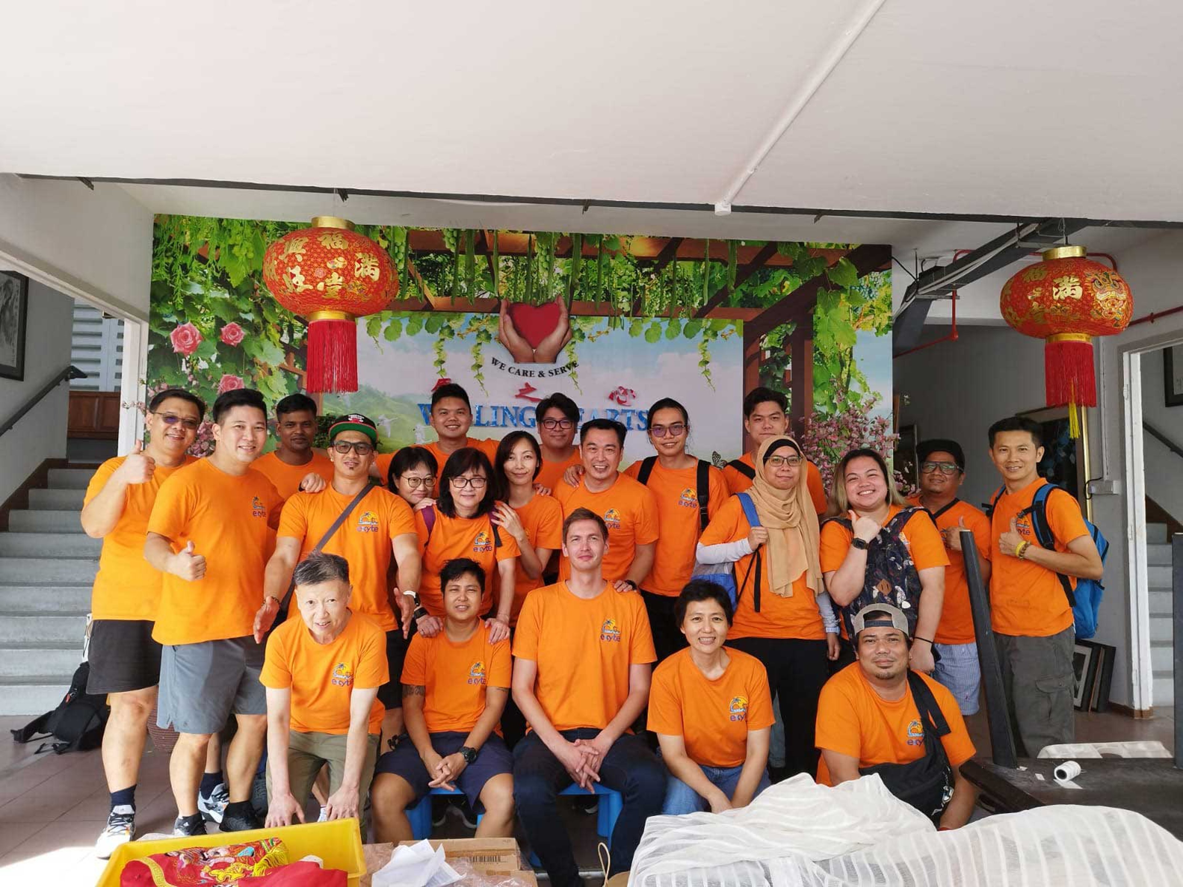 A team of Exyte employees at an event of Willing Hearts, an independent charity running a soup kitchen in Singapore