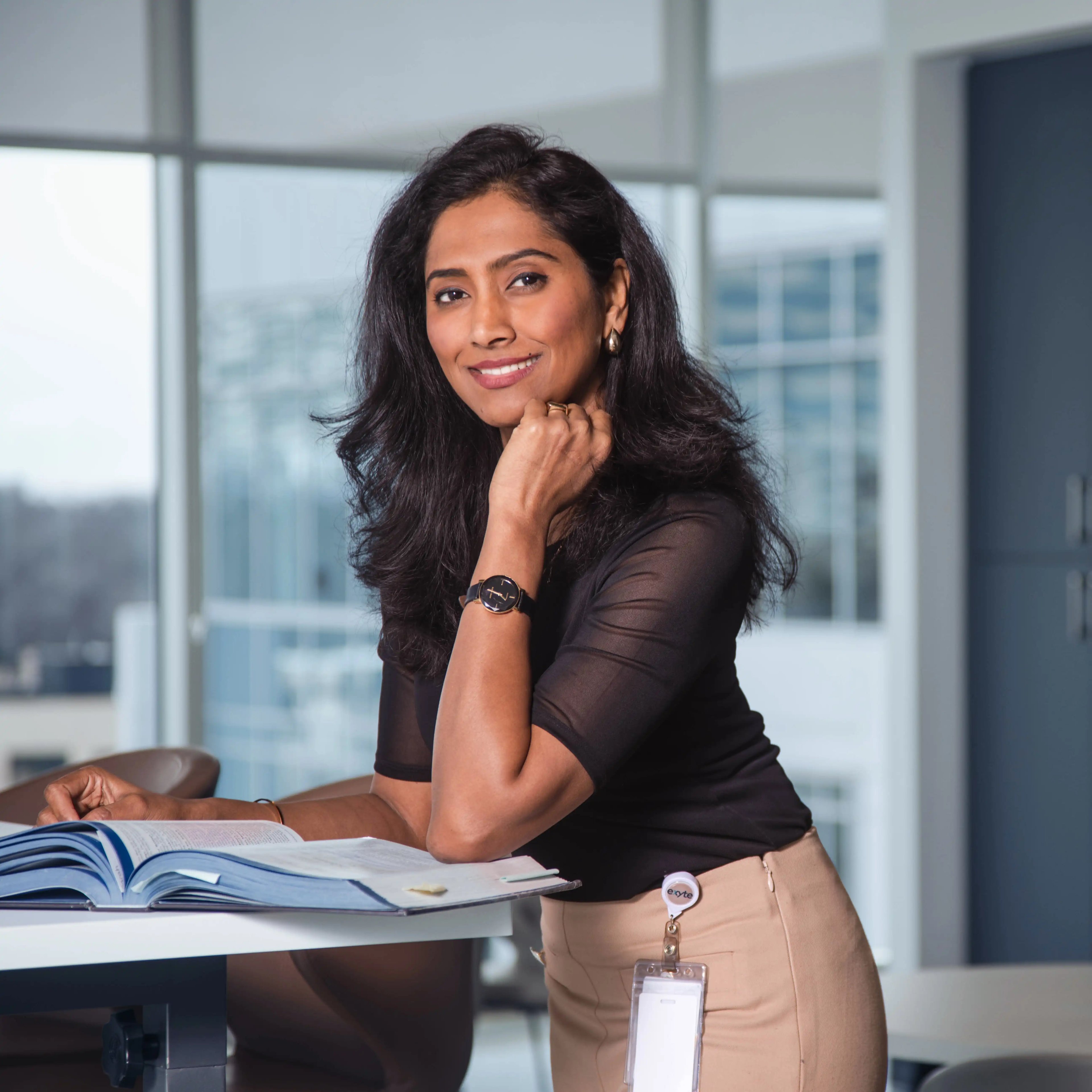 Teresa Alex, Electrical Engineering Manager at Exyte, who drives an electric vehicle, reflecting her work on power systems that enable battery production and electric mobility.