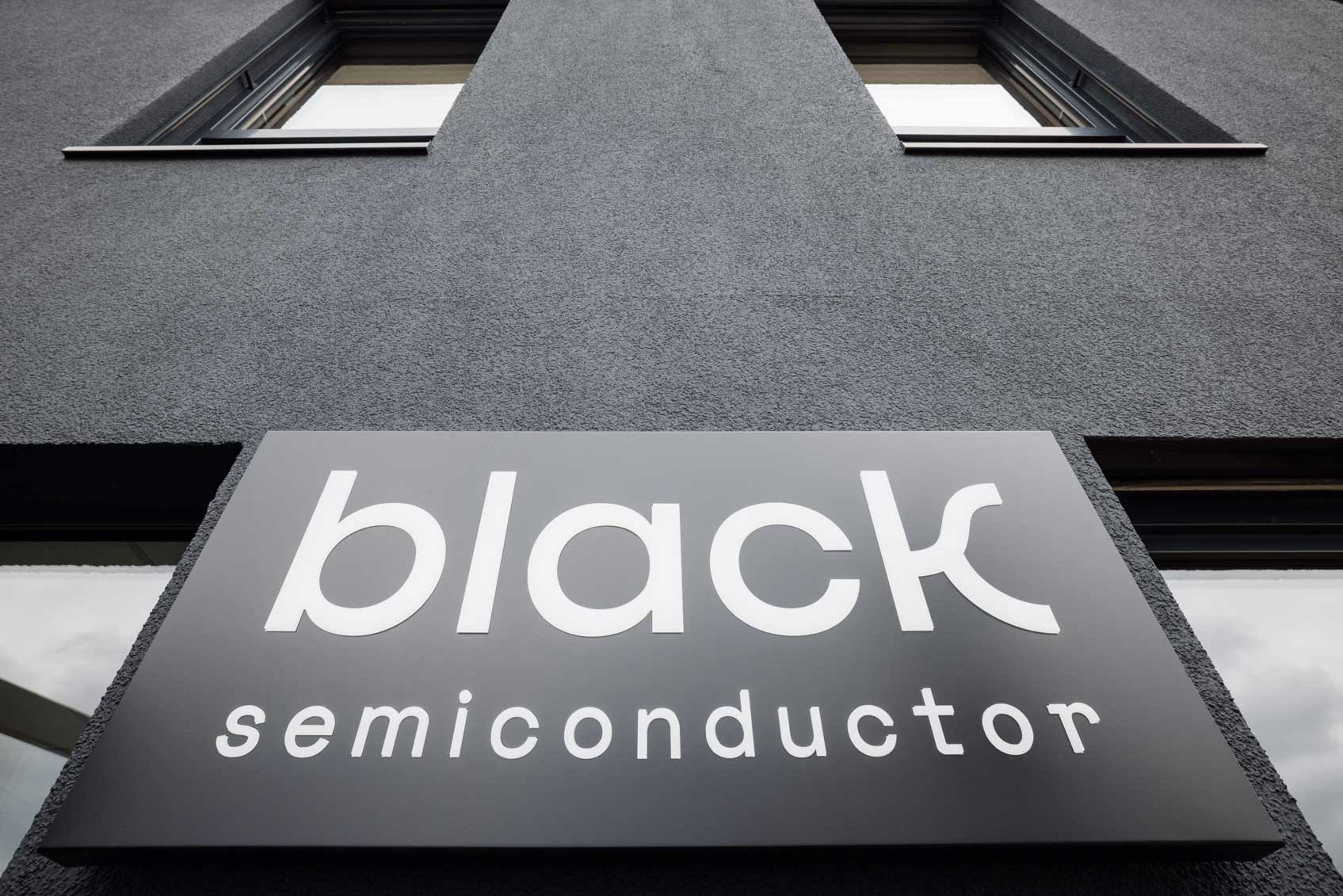 Outside of building with visible logo of Black Semiconductor. Exyte is building and engineering a semiconductor fab pilot manufacturing line for Black Semiconductor