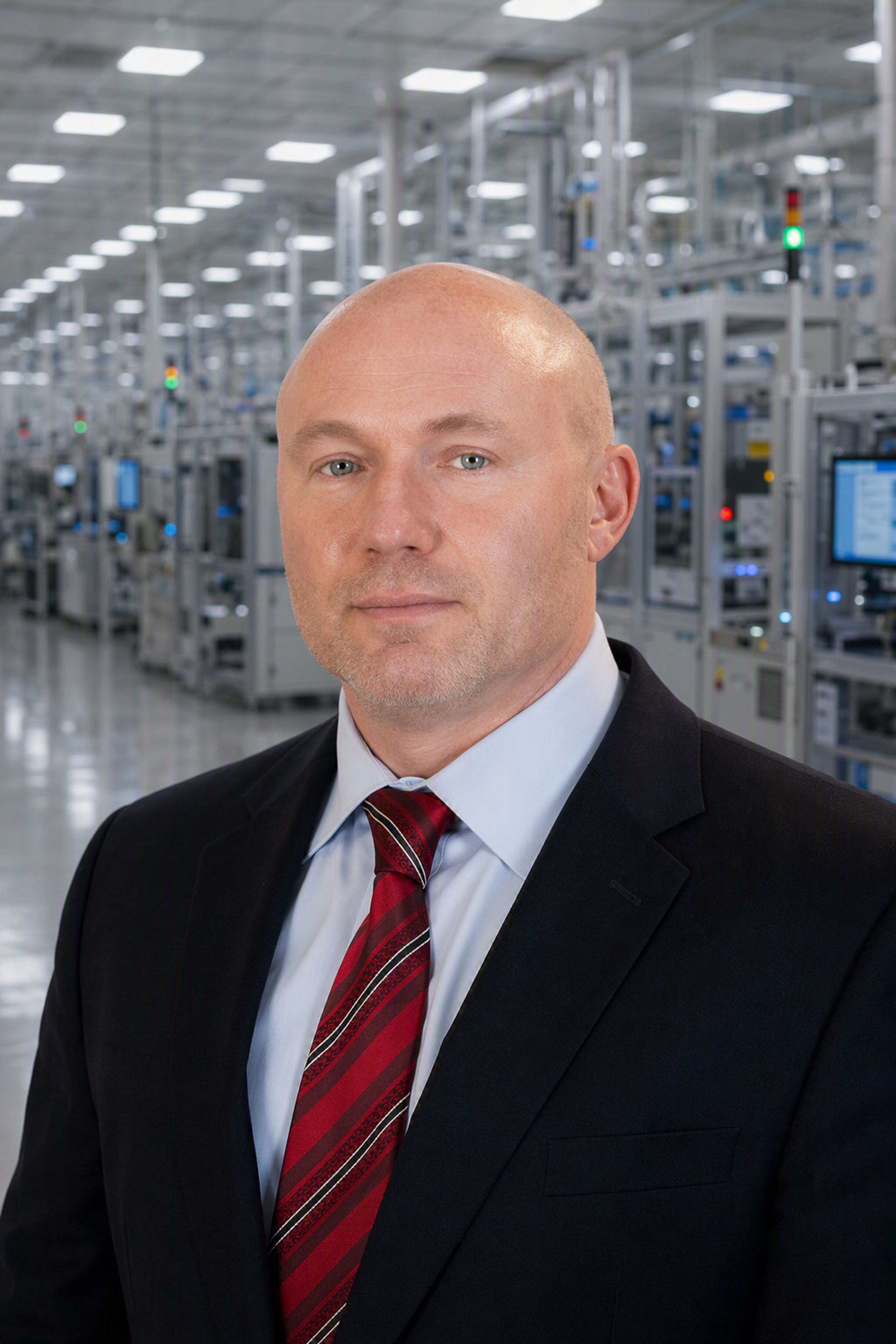 Portrait of Exentec President Operations John Hendrickson, a provider of turnkey solutions in the semiconductor and other high tech industries