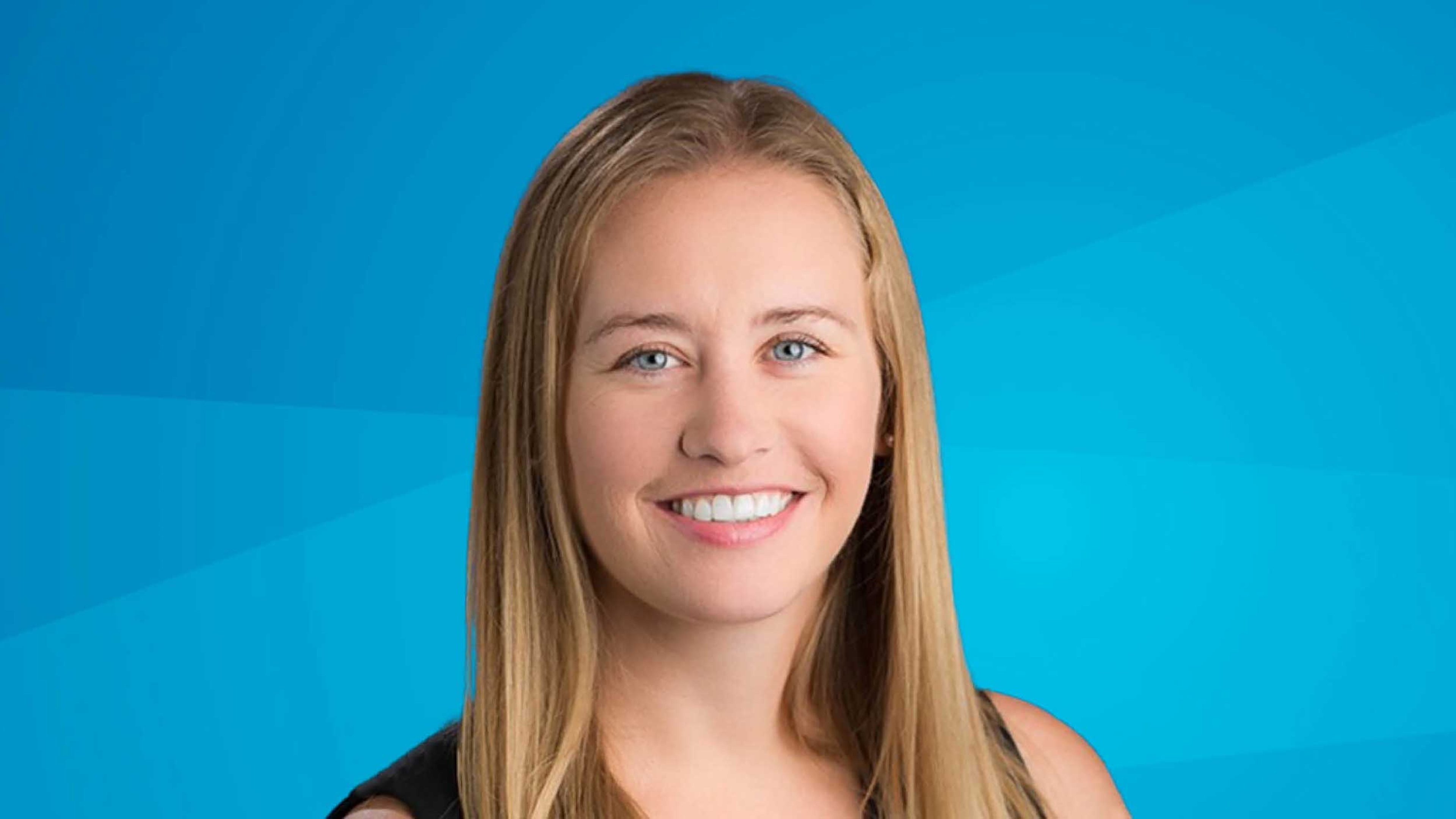 A professional headshot of Mary Burns, smiling with long blonde hair, wearing a sleeveless top, set against a bright blue gradient background.
