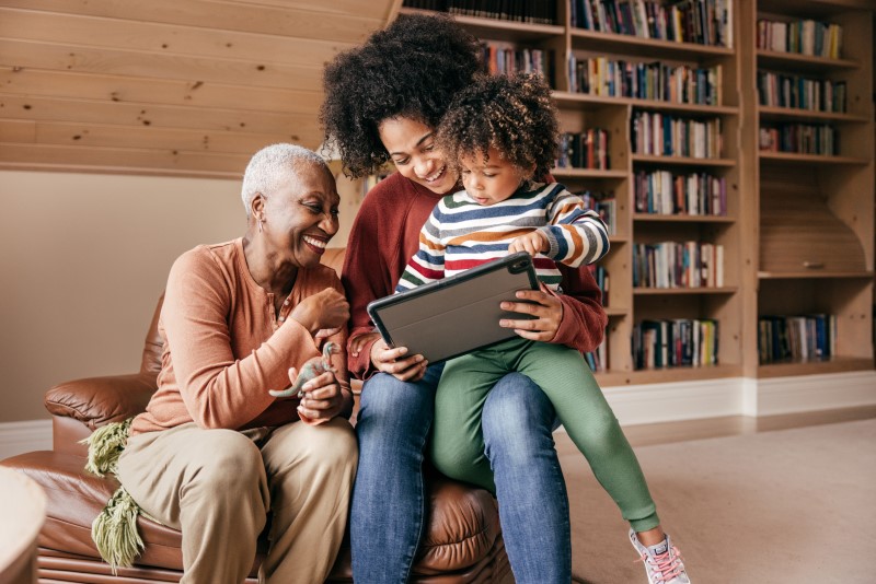 family looking at computer