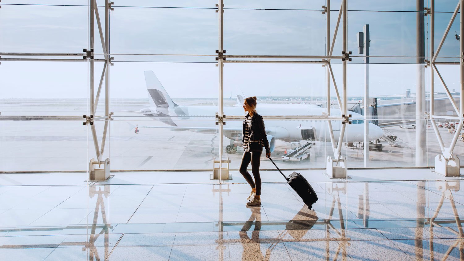 Solo female traveller at the airport