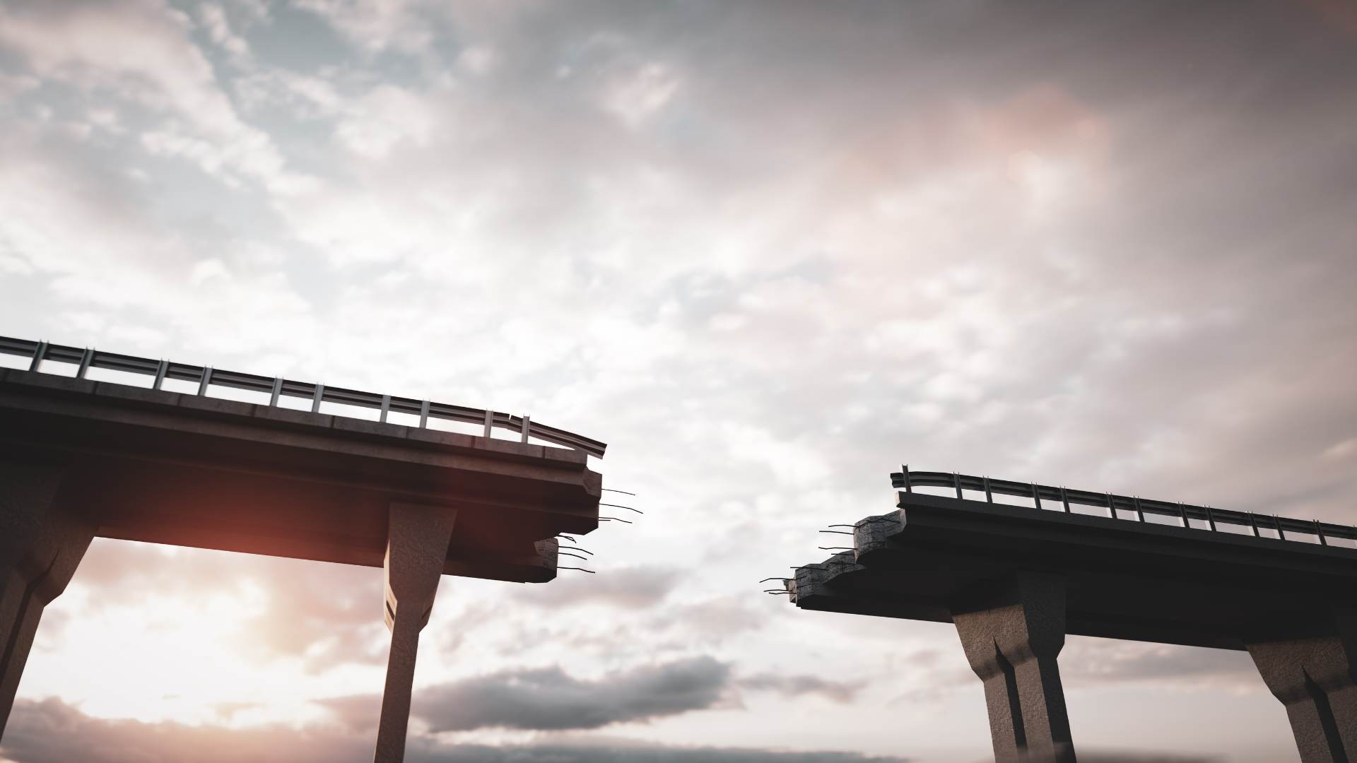 Elevated roadway bridge that is broken. The two segments do not yet connect