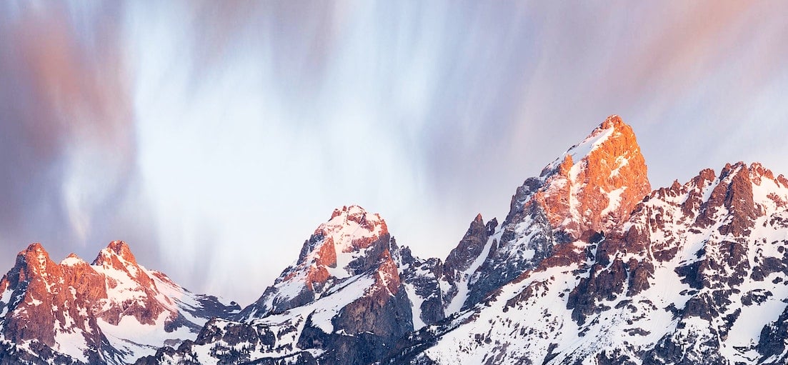 Dramatic sky behind a mountain peak