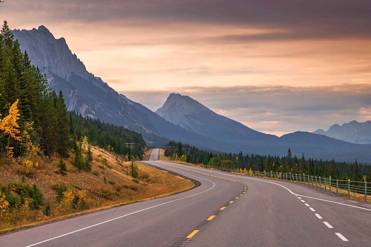 Road through the mountains at dusk.