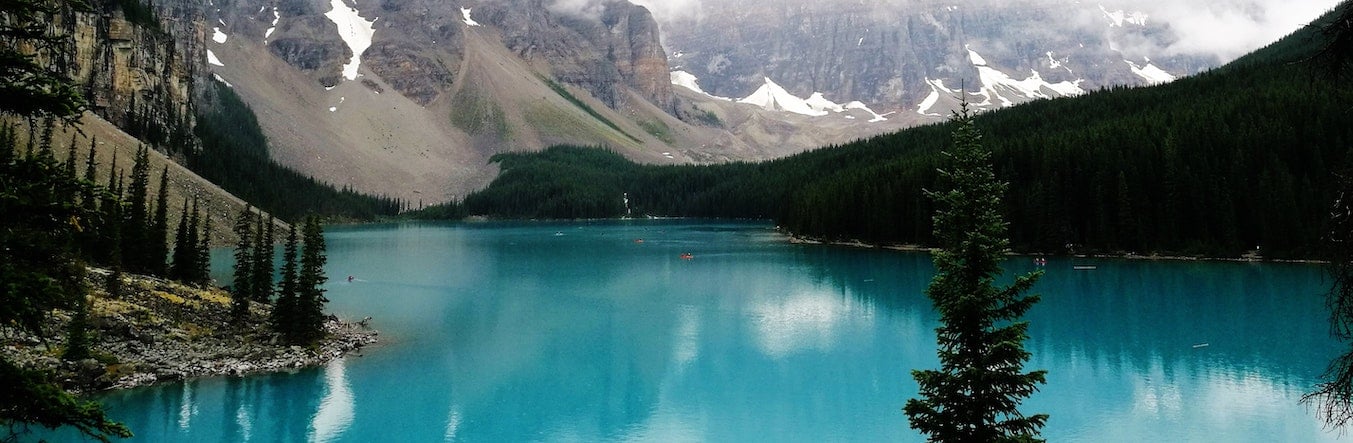 Turquoise blue lake nestled in the mountains