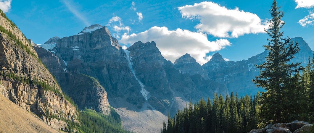 Beautiful blue skies behind a mountain backdrop 