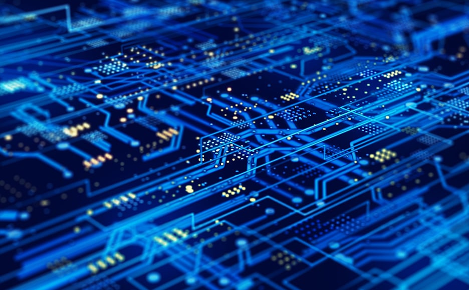 Close-up of a blue computer circuit board.