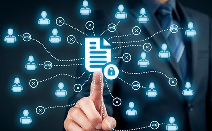 A businessman presents a document against a backdrop of icons representing different business themes and strategies.