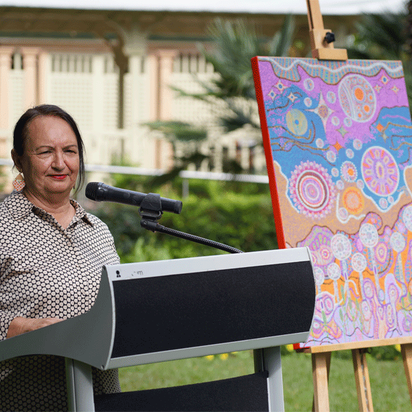 Cheryl Moggs OAM, presenting her artwork for QIC's Stretch RAP