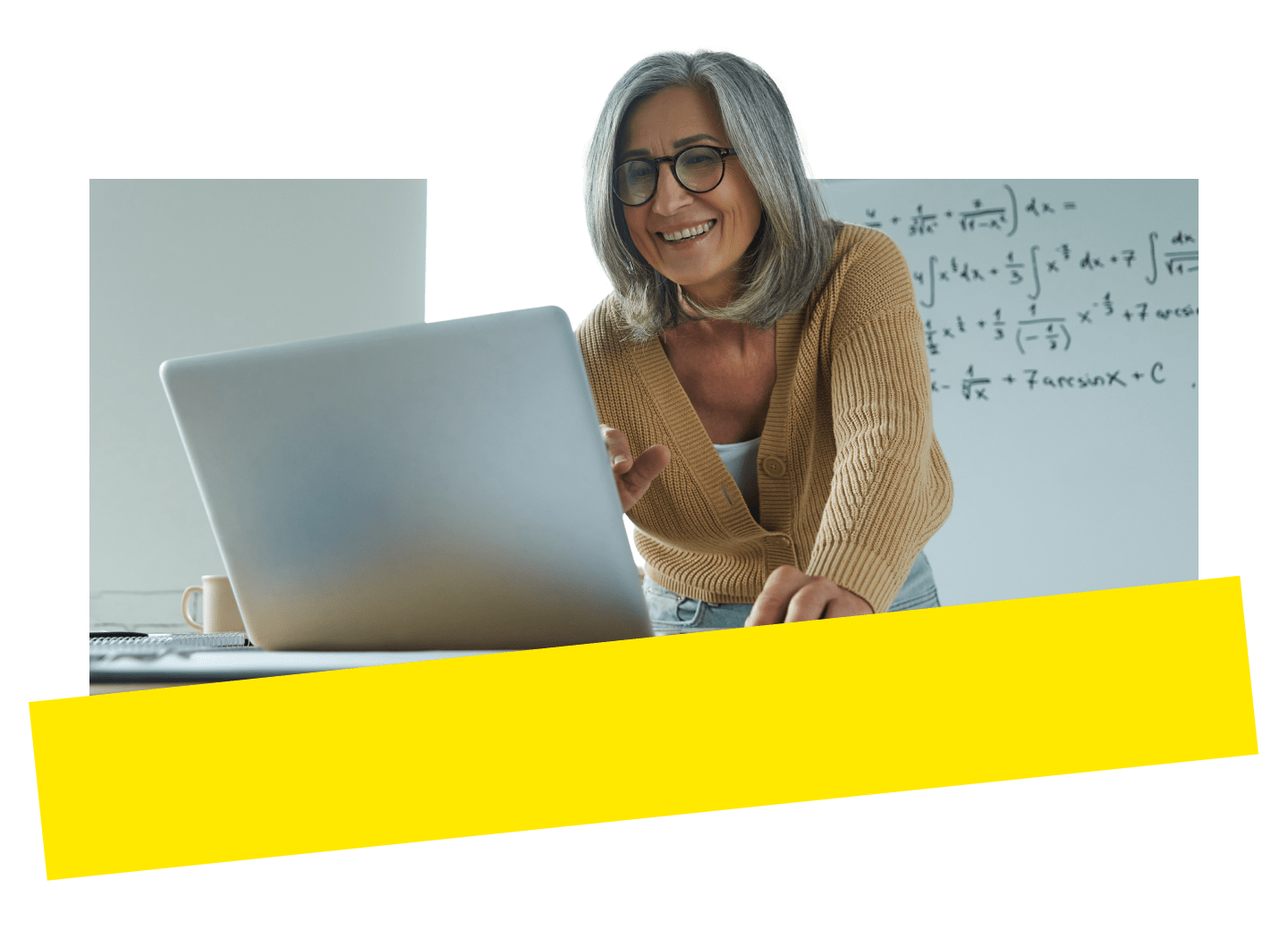 An educator teaching her student virtually via laptop using GoTo Connect.