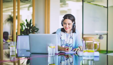 Worker with headset video conferencing with GoToConnect