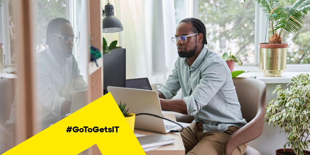 Man working remotely using remote desktop software to restart computer remotely