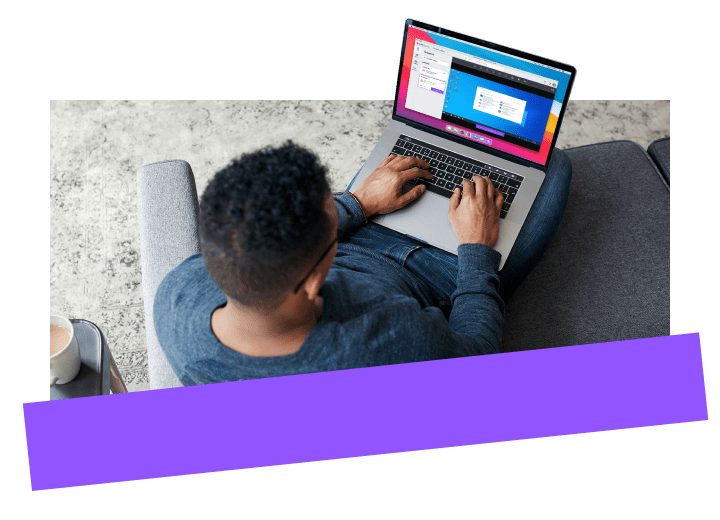 Man on a laptop using GoTo Resolve’s Device Quick View to identify problems without interrupting another user.