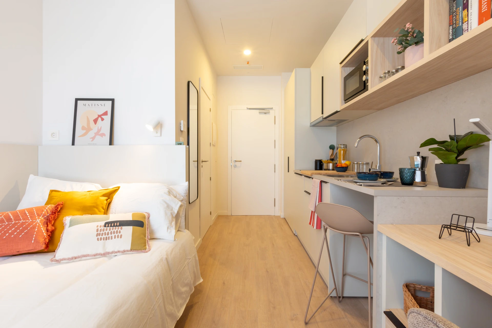a bedroom with a bed and a counter