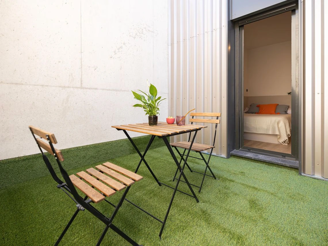 a table and chairs on a patio