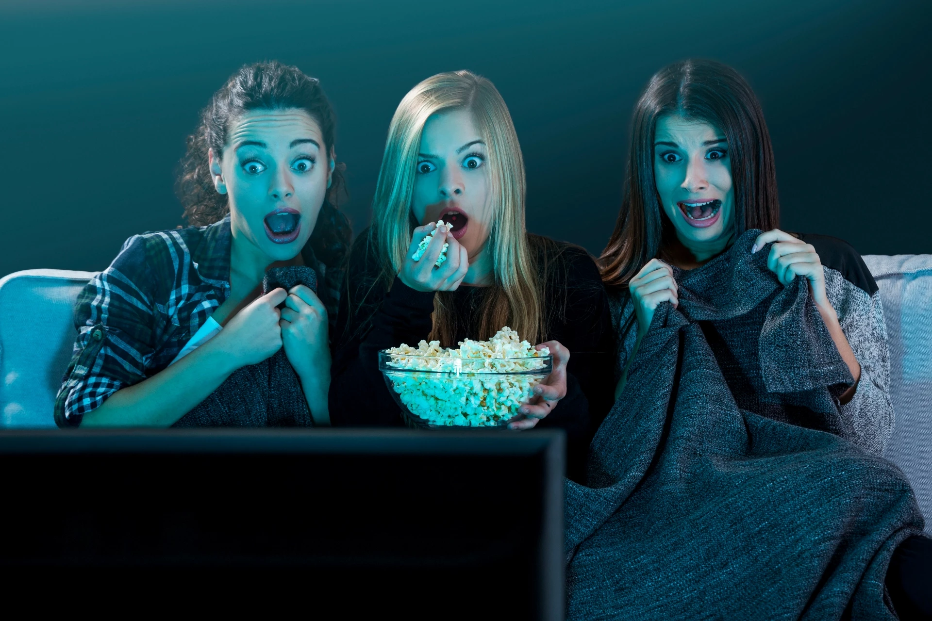 Friends watching scary movie