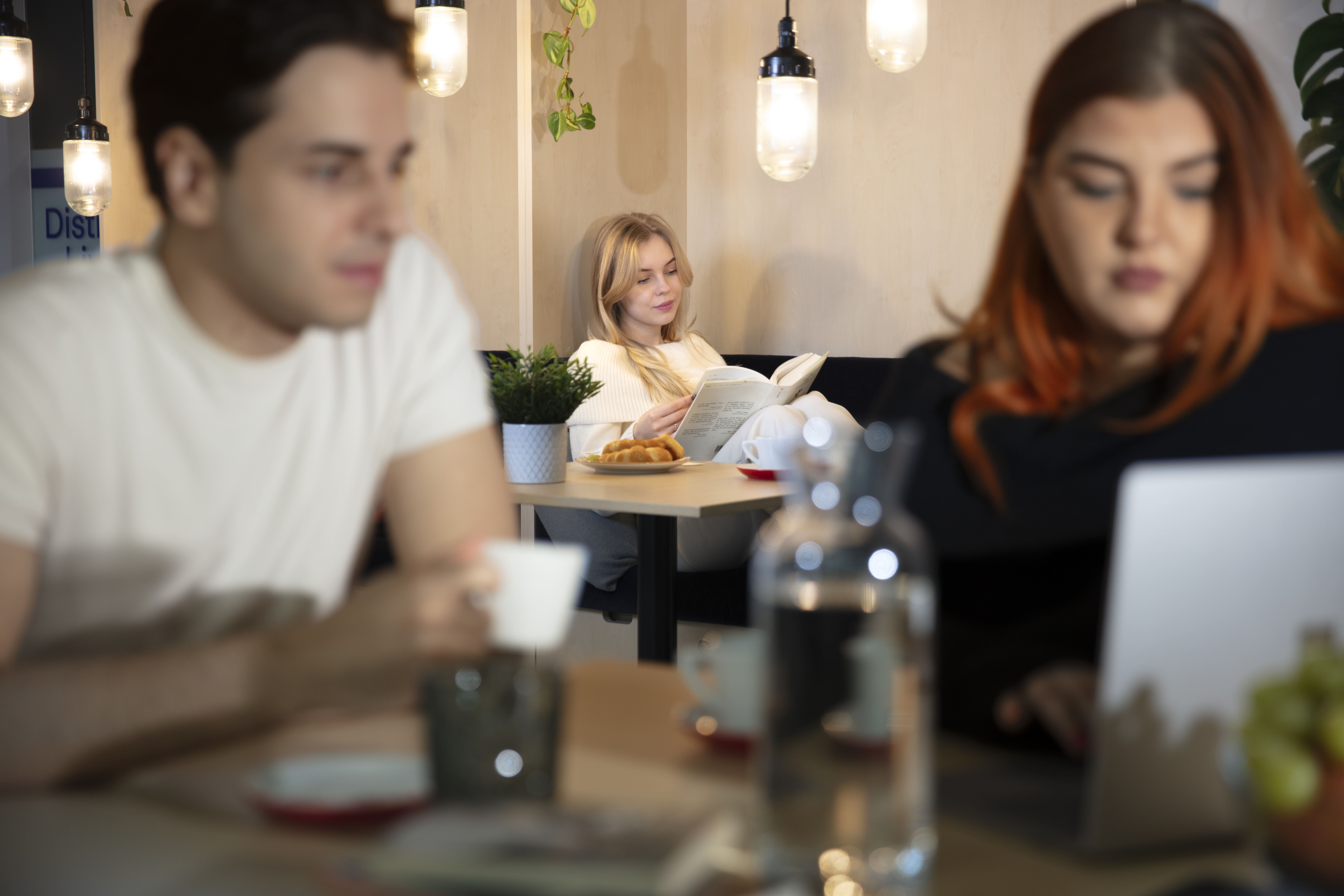 a group of people sitting at a table