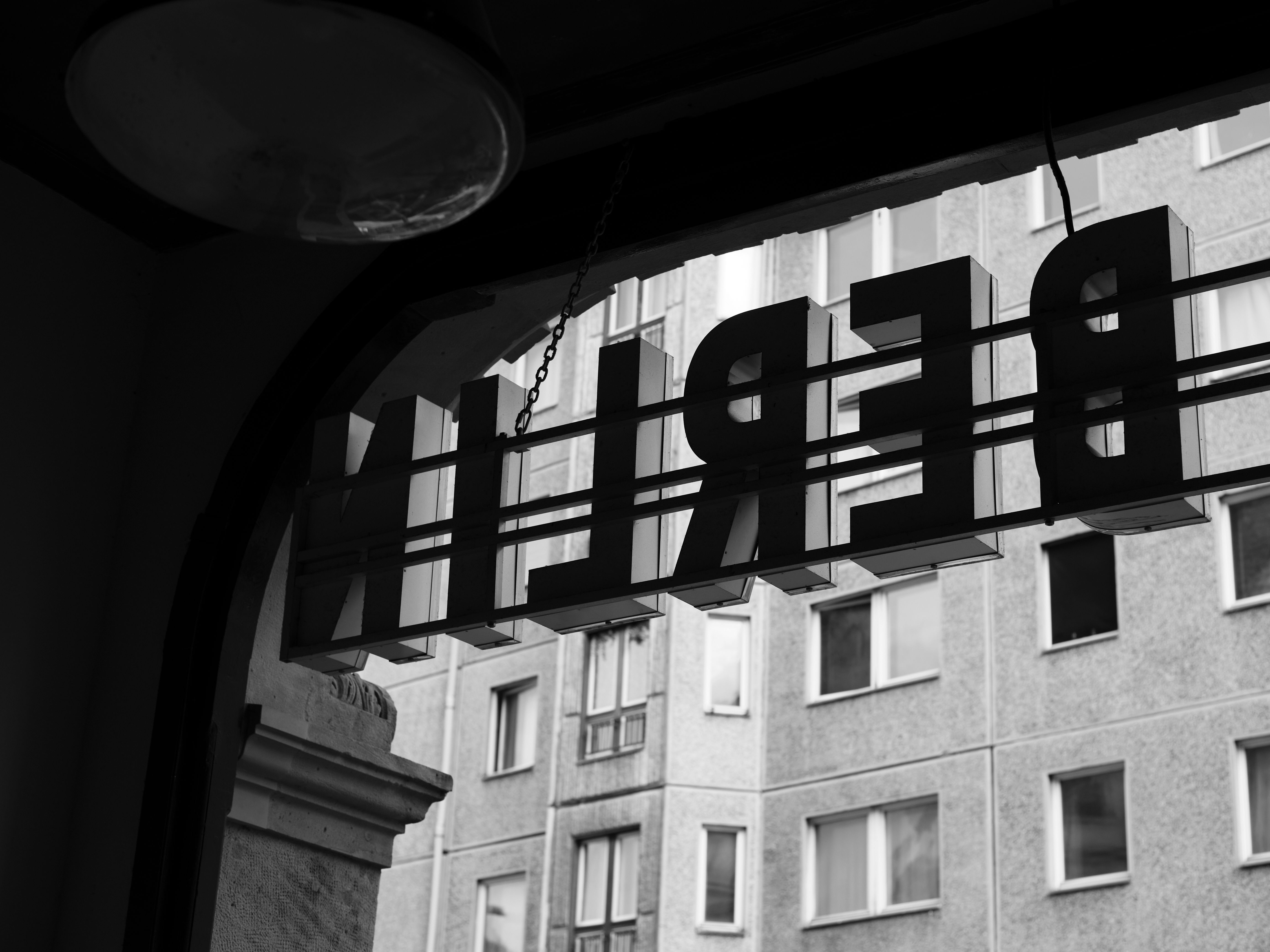 a sign in front of a building