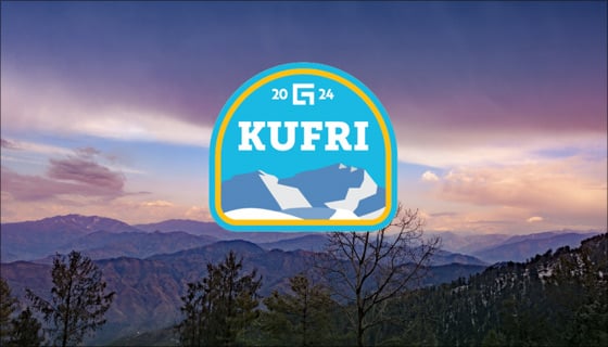 Kufri release badge over image of dark skies and mountains at Kufri, India