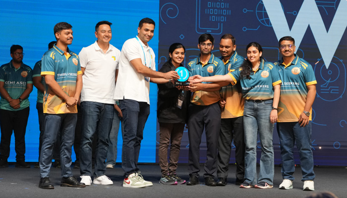 Winning team of devs on stage