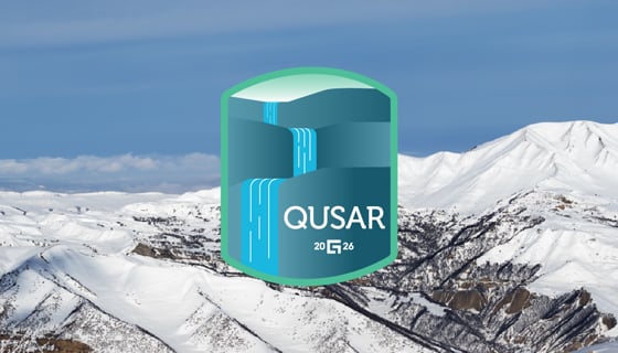 Guidewire Qusar release badge over background image of snow-covered mountains