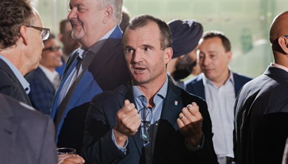 Men in group talking