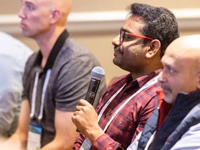 Audience member holding a microphone