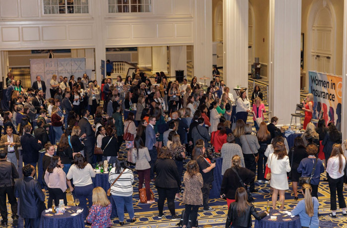 elevated view of large group at the women's reception