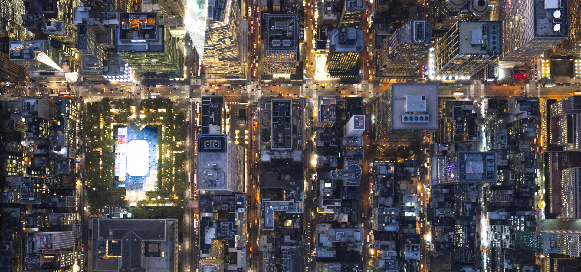 aerial shot looking down on a large city center, from several hundred feet above