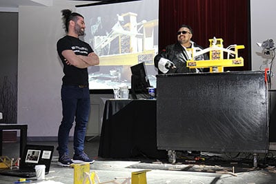 Winner Remon Essa (left) is seen with his winning bridge.