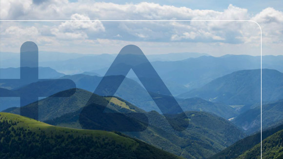 Positive change logo overlaid over mountain scenery 