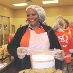 Woman volunteers at Forgotten Harvest
