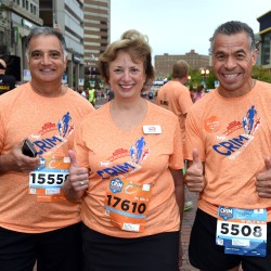 Thumbnail From left to right first time Crim 5K Runner Bob Minasian HAP President and CEO Terri Kline and HAP supported Ironman competitor Raul Sosa