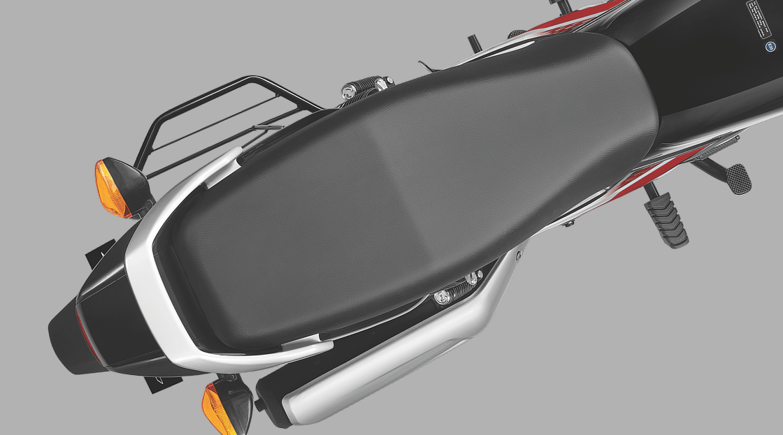 Honda Shine 100 – Longer and Comfortable Seat — Keeps both rider and pillion comfortable.