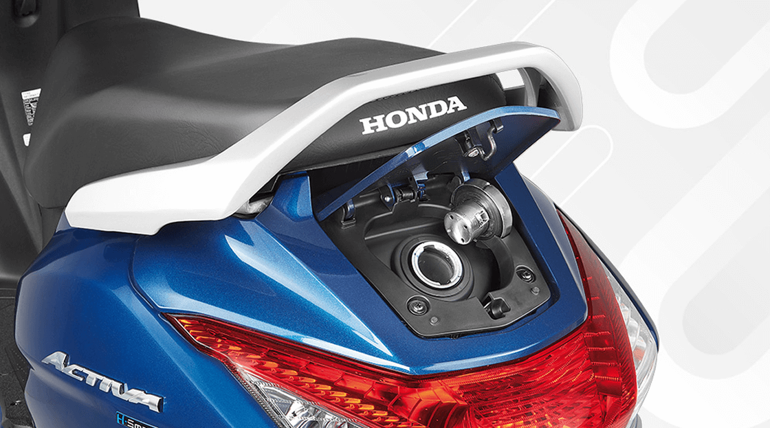 Honda Activa – Double Lid External Fuel Fill — Refuel without leaving your seat.