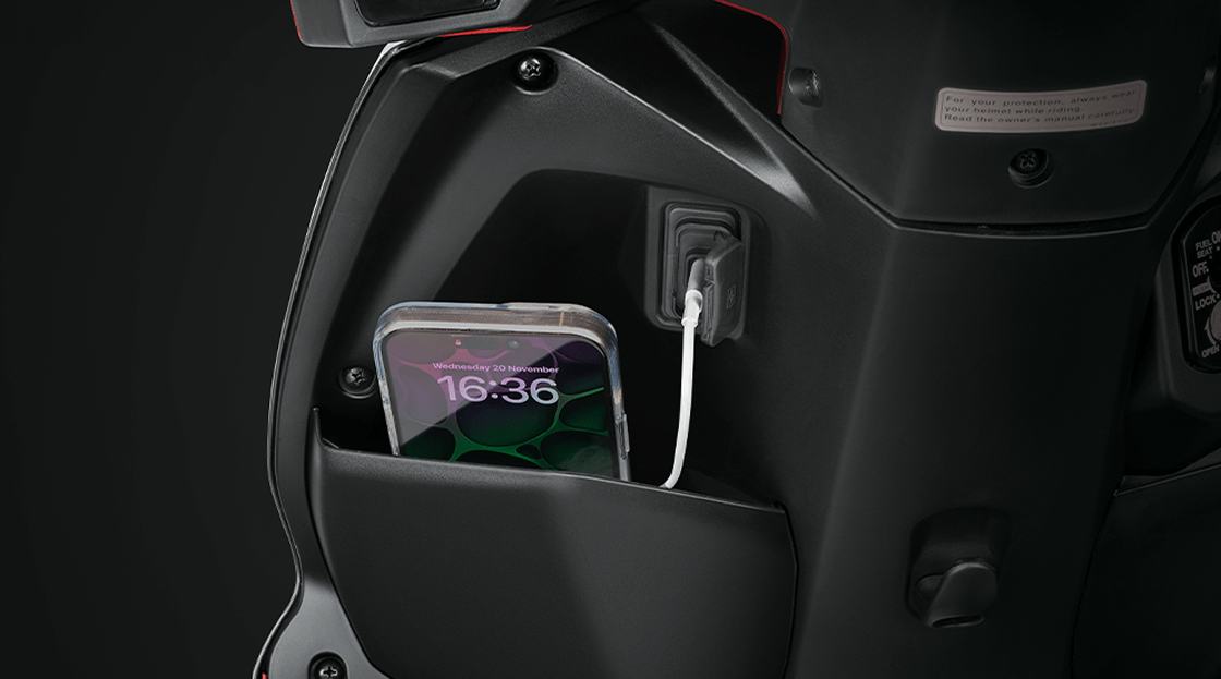 Honda Dio – Open Glove Box with 15W USB-C Port — Convenient storage for smaller items.