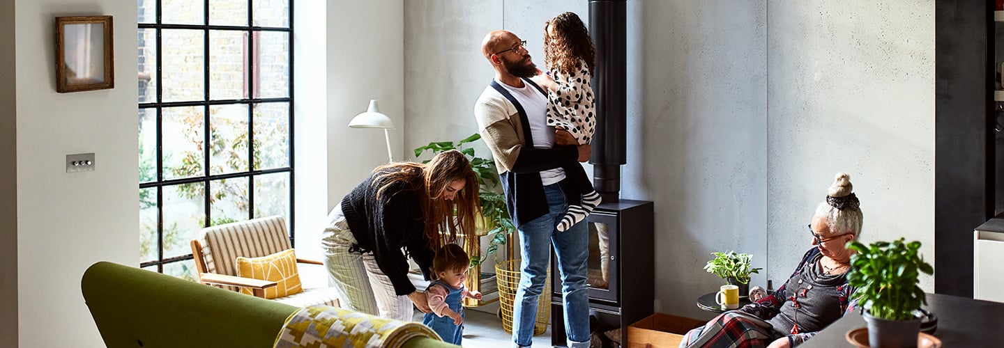 Family interacting in the living room of their home