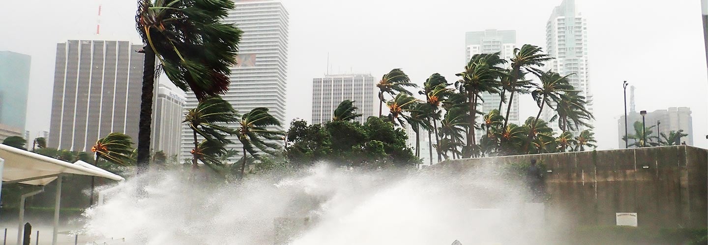 Large waves crashing on concrete